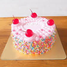 Strawberry cake topping with cherries and Sprinkles