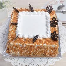 Rectangle shaped Butterscotch cake with garnish